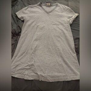 Gray and white striped v-neck maternity shirt.